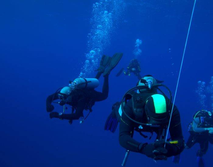 Group of divers on 5-min safety stop, Cuba